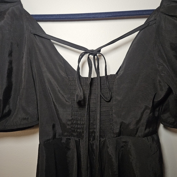 Cute Black Peplum Top With Puff Sleeves - Picture 4 of 7